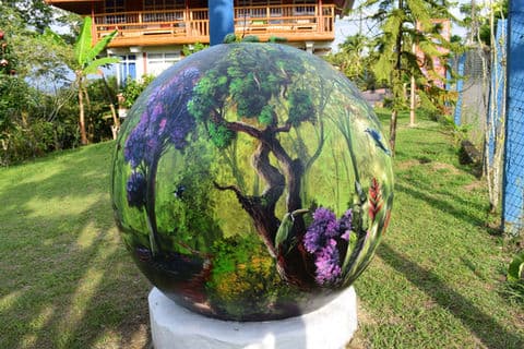 Painted sphere garden art